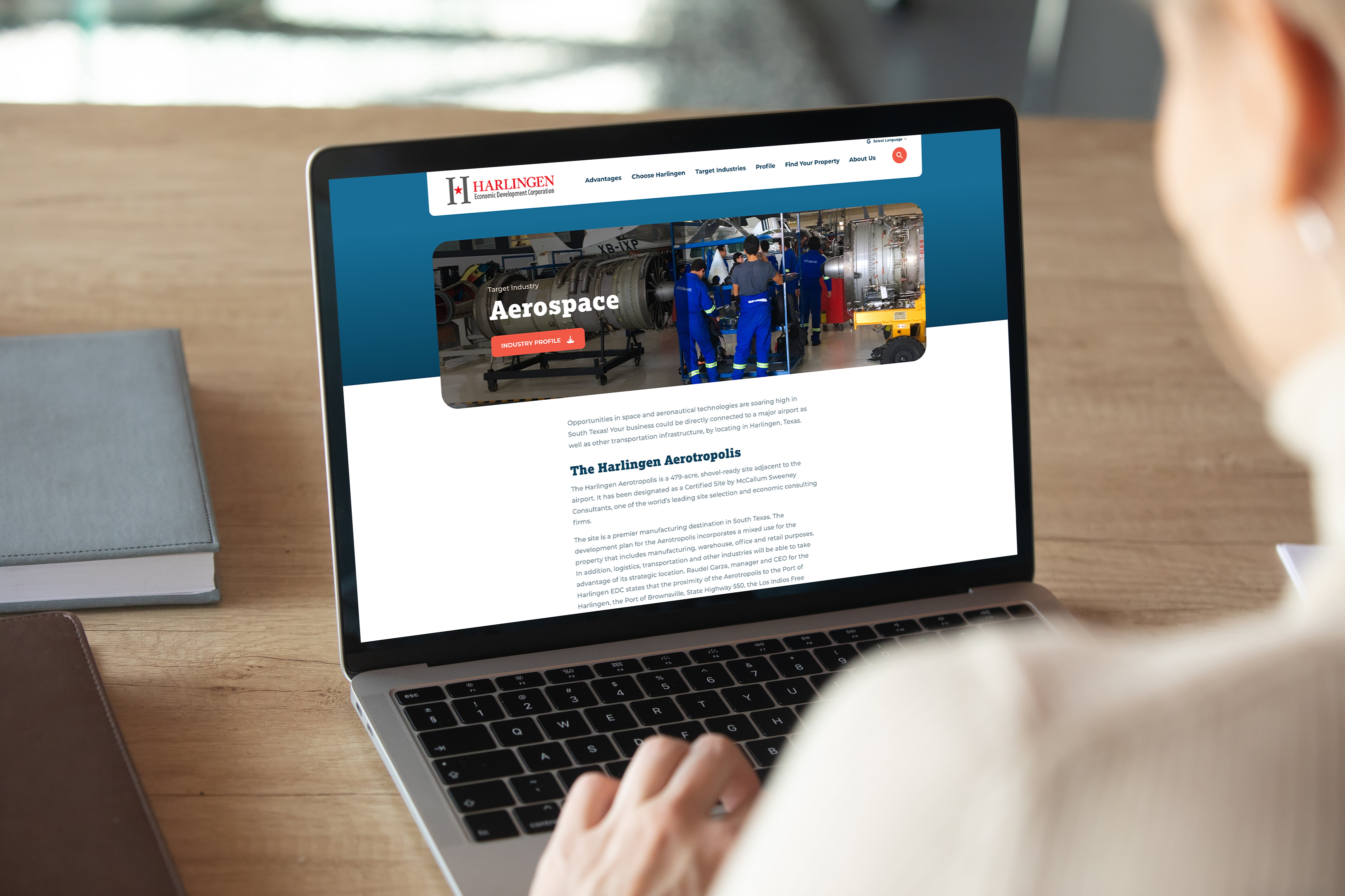 Background view of a man on Harlingen's site on his computer